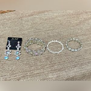 Lot of 4 pieces of Costume Jewelry.  3 bracelets & 1 pair of earrings